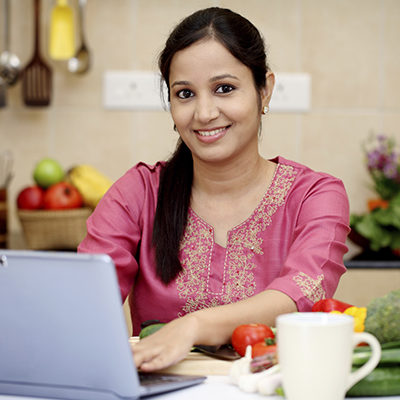 A woman uses a computer