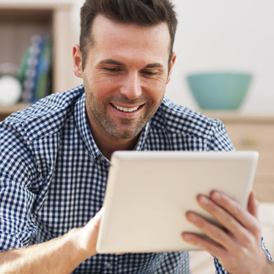 A man uses a tablet