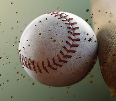 A baseball being hit by a bat