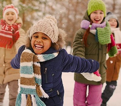 Four children ice skating