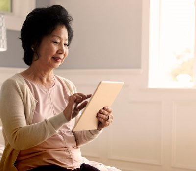 A woman on a tablet device