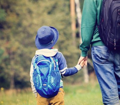 Brothers waiting for the school bus