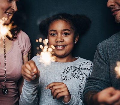 A family holding roman candles