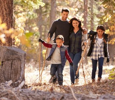 A family hiking in the woods