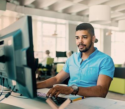 A man using a computer at work