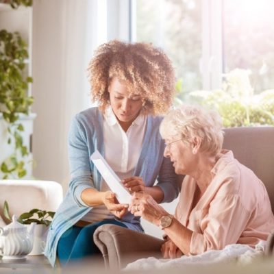 Woman helping her mother