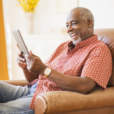 man using digital tablet