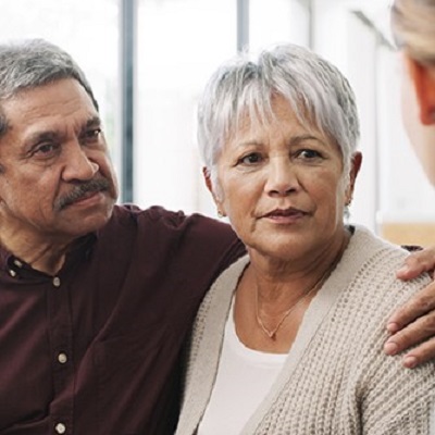 couple discussing their benefit options