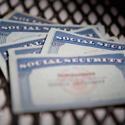 Social Security cards on a table